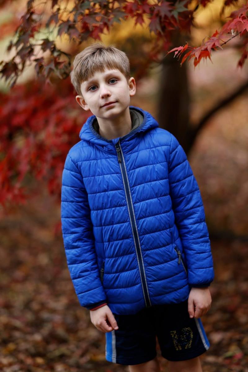 Boy in blue jacket