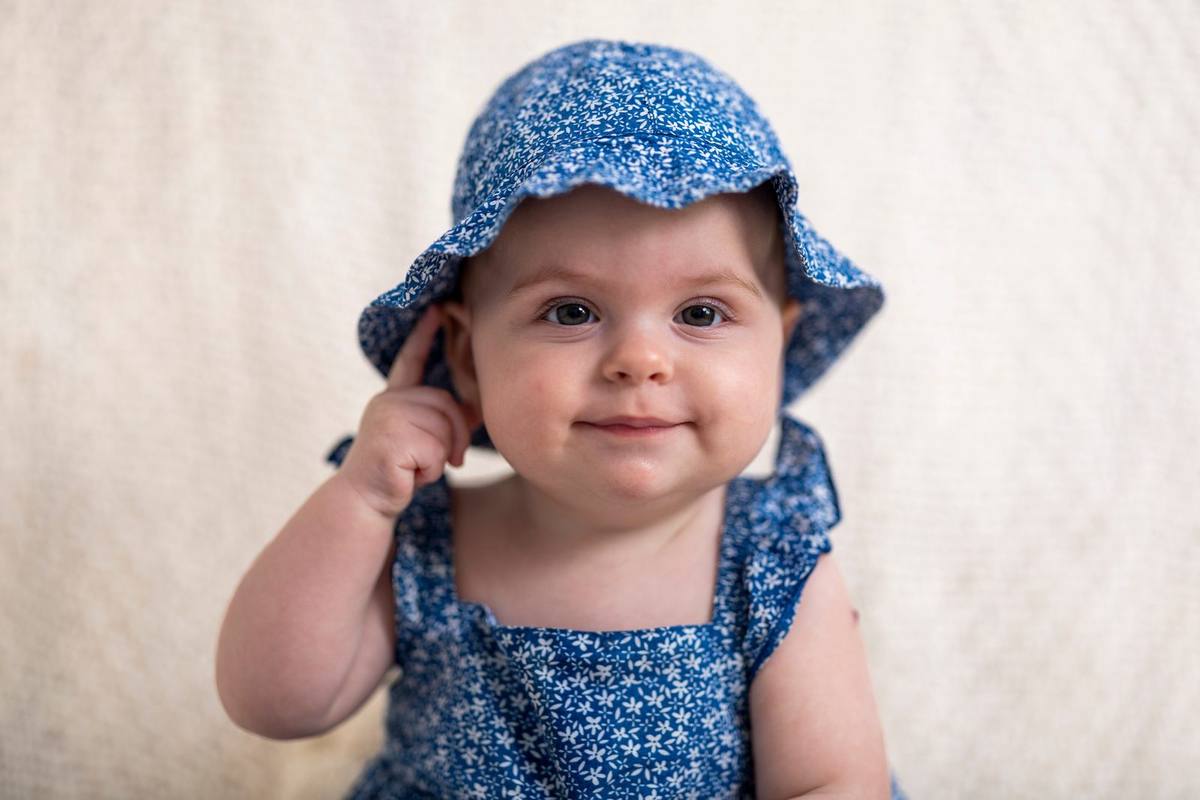 Baby in blue hat