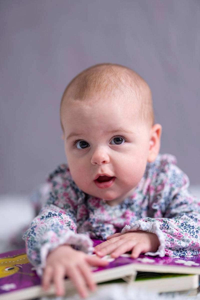 Baby on book